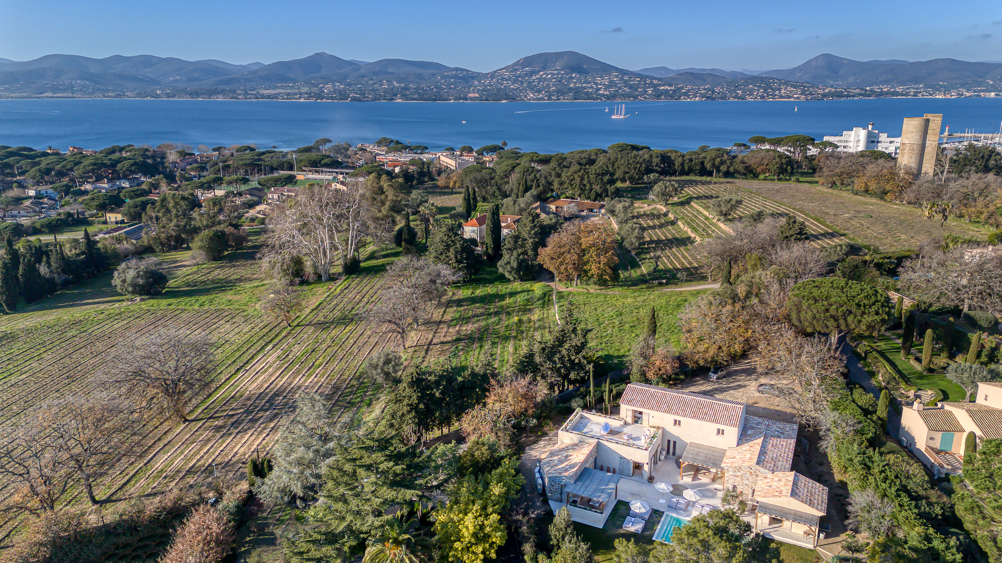 Aerial view of Villa Nu among the pines facing the Gulf of Saint-Tropez