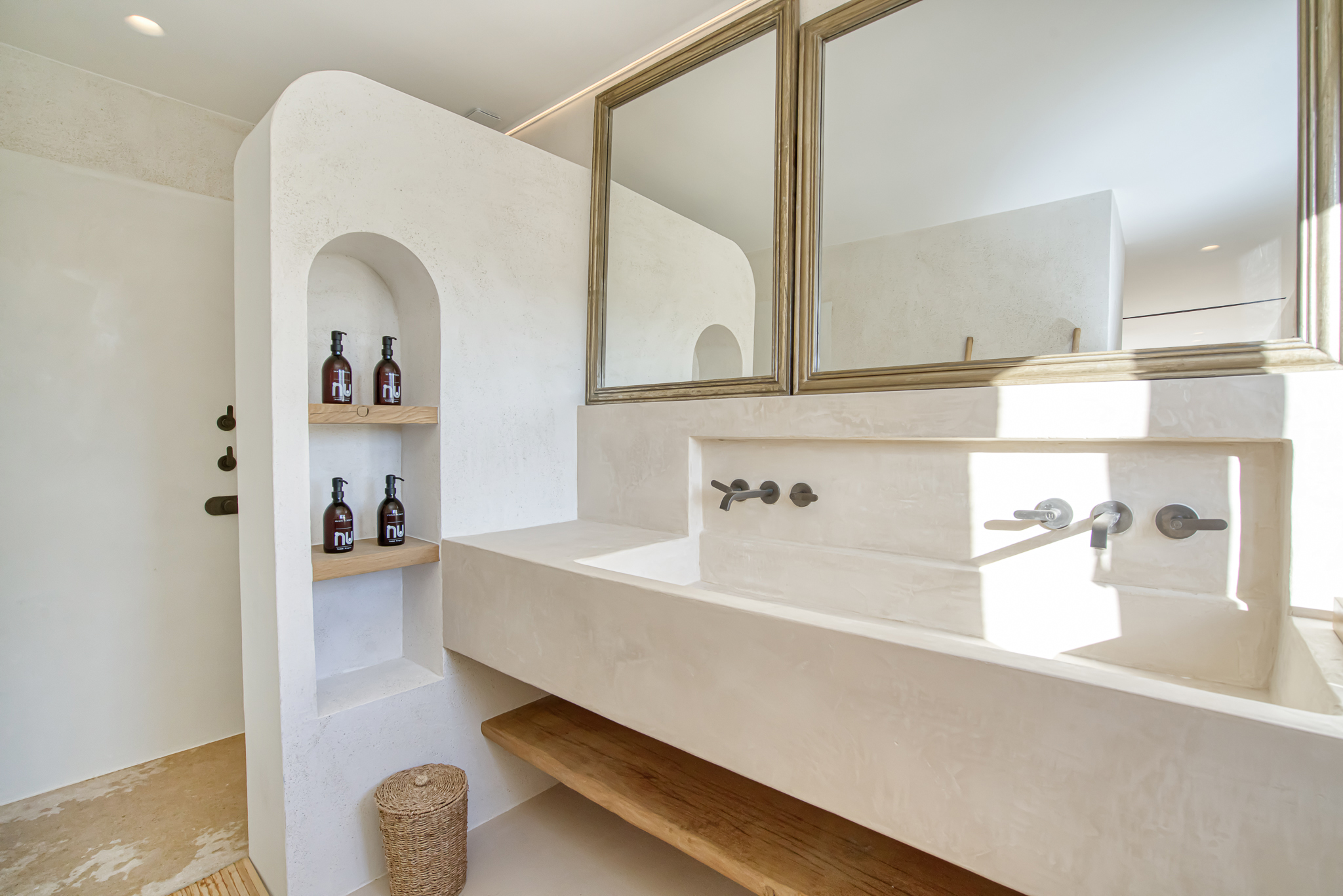 Polished concrete bathroom at Villa Nu