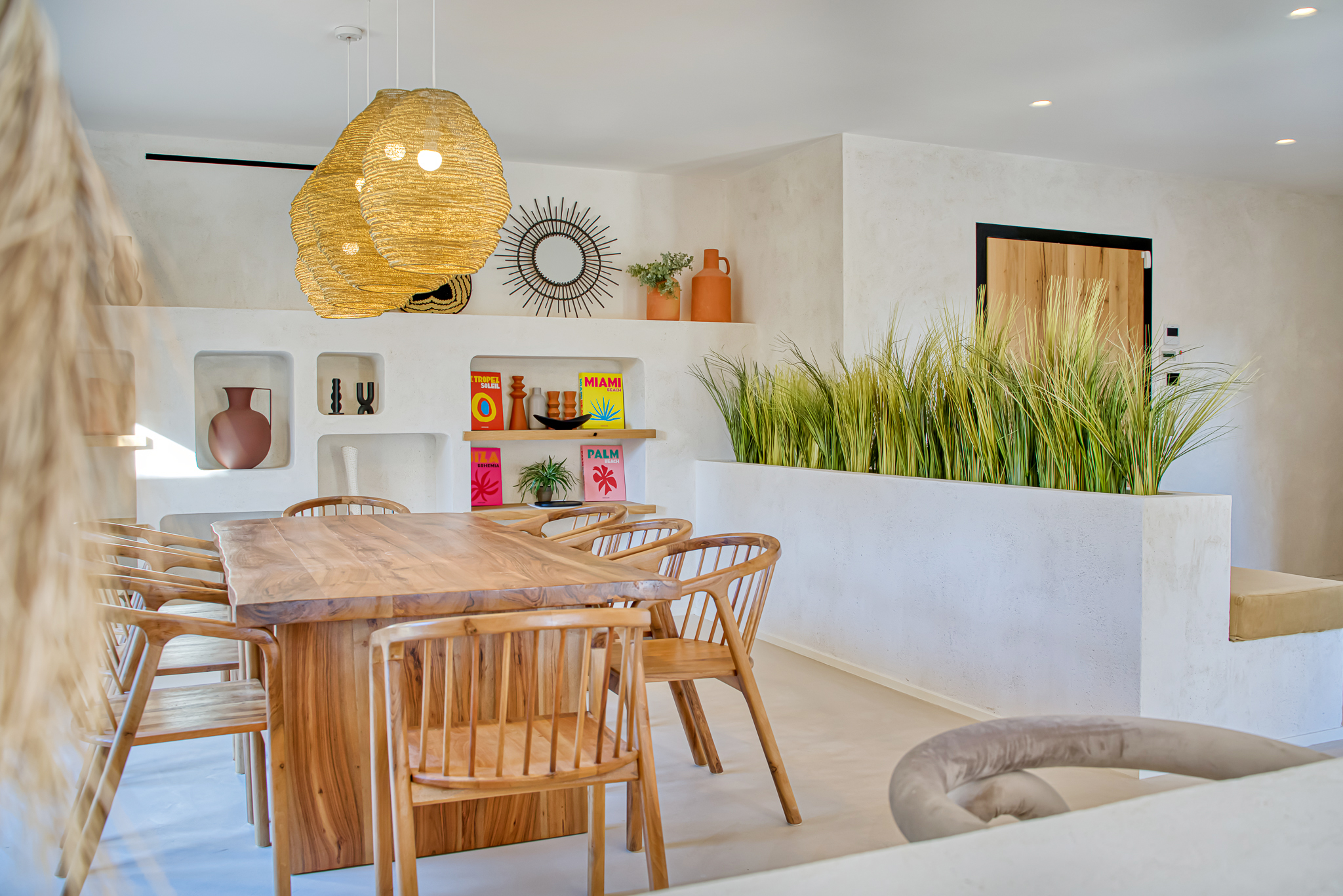 Bright, convivial dining room at Villa Nu